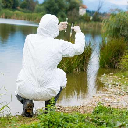 Man Testing Lake For Pollution